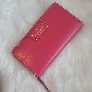 Kate Spade pink zip-around wallet